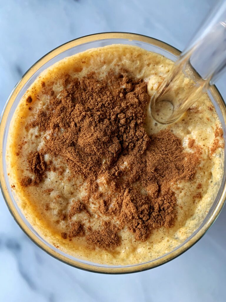Healthy Iced Pumpkin Spice Latte made with all vegan ingredients. This is a healthier way to make your own pumpkin latte without all the added sugars!