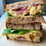 The absolute best vegan Chickpea Salad Sandwich! This is such an easy and delicious plant-based recipe to make for lunch or dinner and it comes together in 5 minutes.