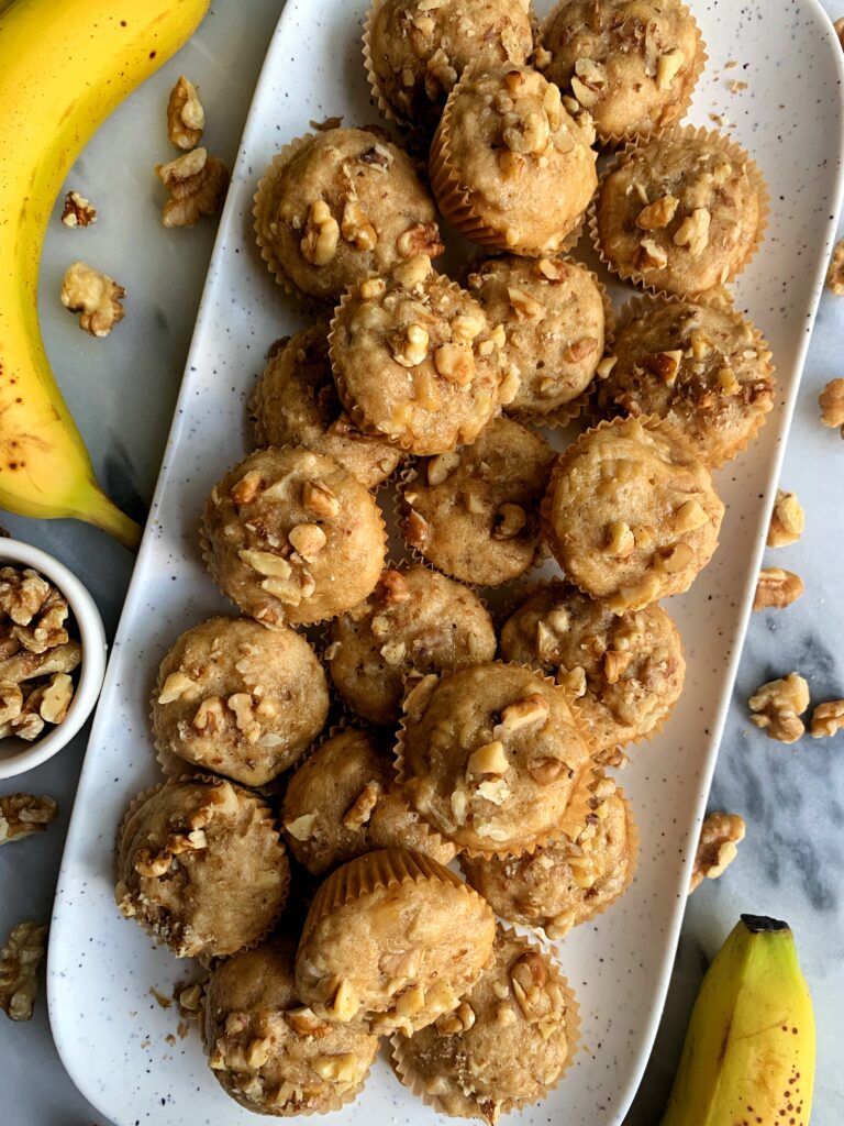 EPIC Gluten-free Mini Banana Walnut Muffins that remind me of those cutie Little Bites muffins I used to eat growing up. Except these are gluten-free, dairy-free and lower in sugar baby!