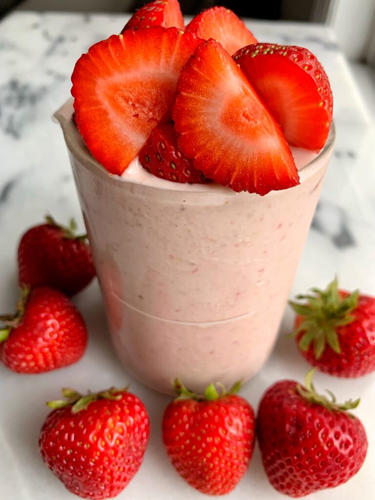 The Best Strawberries and Cream Smoothie to start your mornings with. Or even enjoy as a dessert or snack. Filled with delicious ingredients and it's dairy-free, gluten-free and toddler approved.