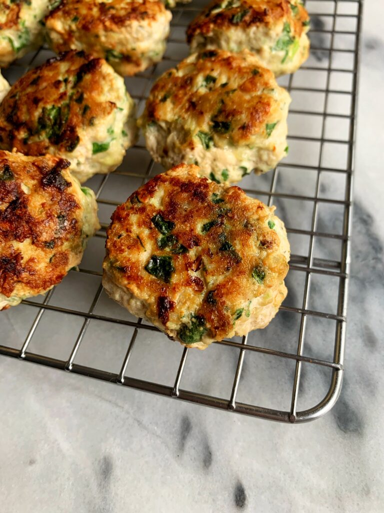 The Best Homemade Chicken Meatballs in the world! Of course we are biased but these really are the best healthier chicken meatballs and they're gluten-free, can be whole30 and the best way to sneak in veggies!