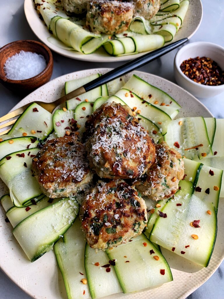 The Best Homemade Chicken Meatballs in the world! Of course we are biased but these really are the best healthier chicken meatballs and they're gluten-free, can be whole30 and the best way to sneak in veggies!