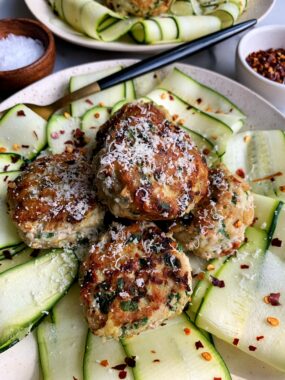 The Best Homemade Chicken Meatballs in the world! Of course we are biased but these really are the best healthier chicken meatballs and they're gluten-free, can be whole30 and the best way to sneak in veggies!