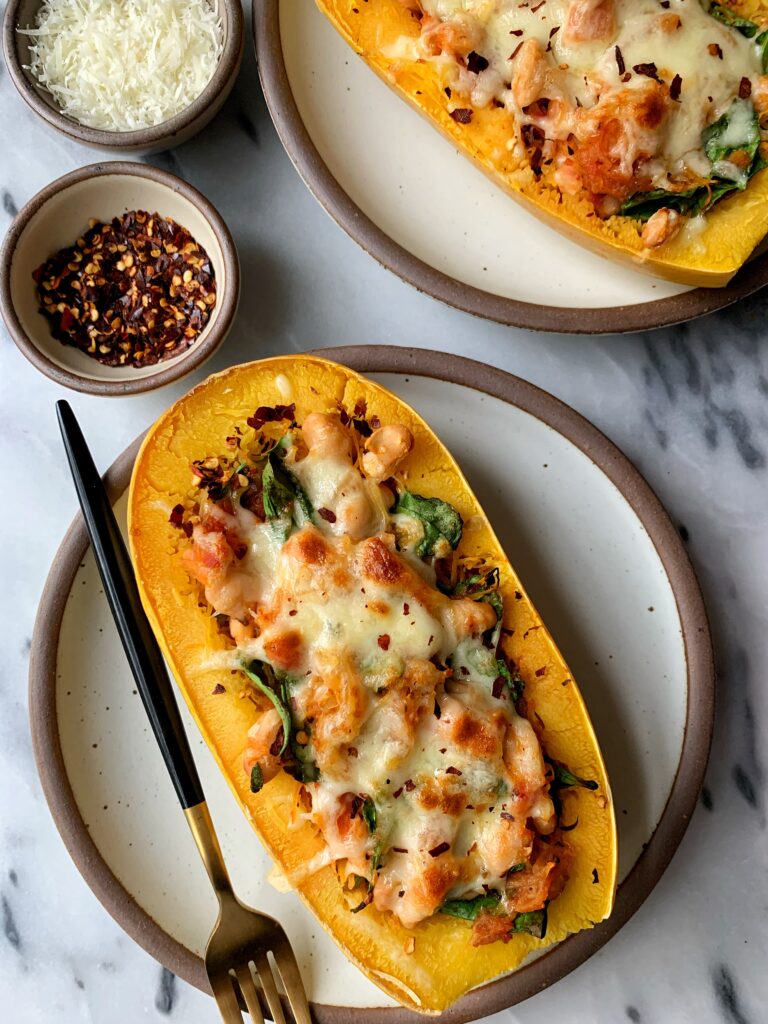 Delicious and easy Vegetarian Spaghetti Squash Pasta Boats! One of my favorite meatless meals that is easy to make and the whole family loves!