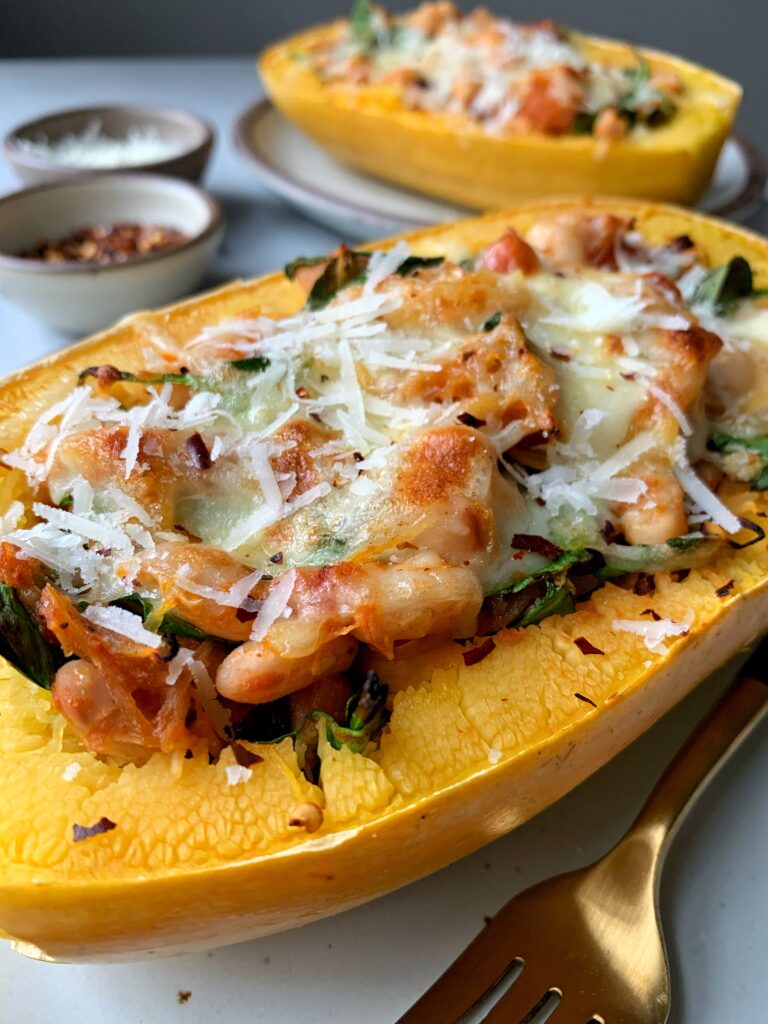Delicious and easy Vegetarian Spaghetti Squash Pasta Boats! One of my favorite meatless meals that is easy to make and the whole family loves!