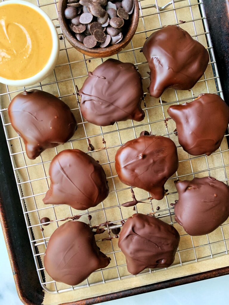 4-ingredient Reese's Pumpkins! Sharing how to make these easy and healthier copycat Reese's Pumpkins at home. Using all gluten-free and vegan ingredients.