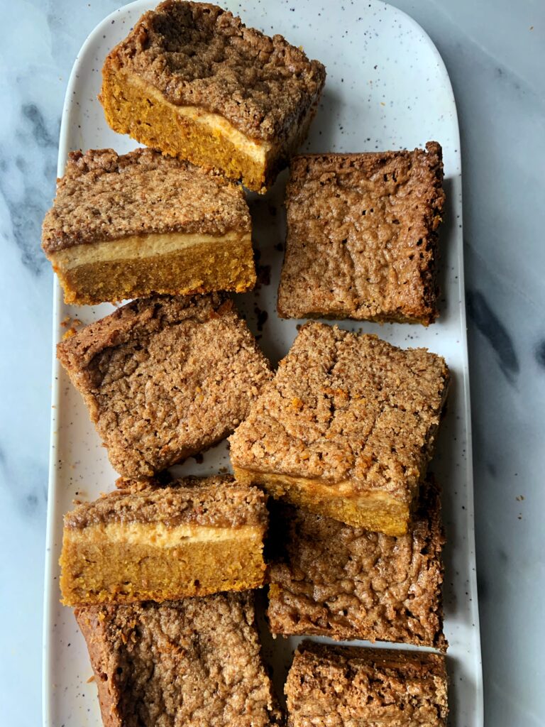 This Gluten-free Pumpkin Crumb Cheesecake is the ultimate dessert recipe to make for the holiday season. Plus it is made with healthier ingredients than your usual pumpkin cheesecake recipe!