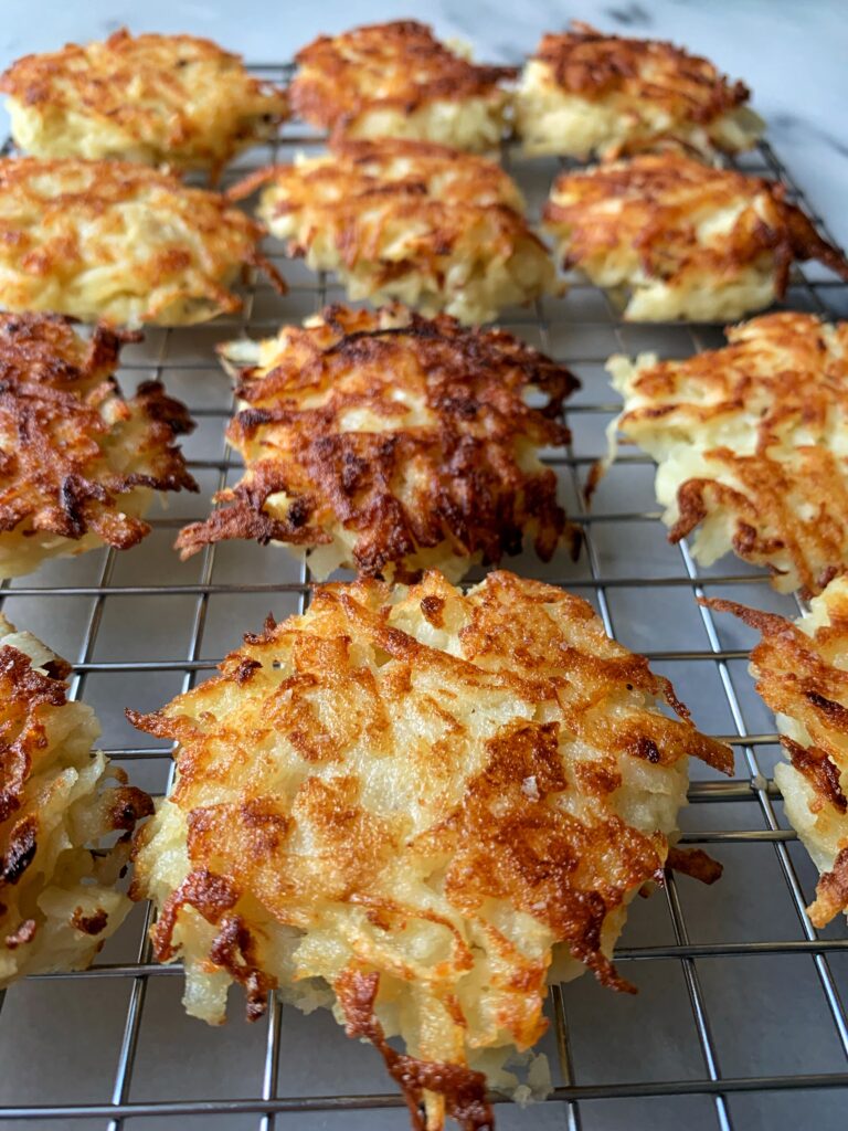 These Mini Potato Latkes with Smoked Salmon are the perfect appetizer or side dish. Plus they are paleo, gluten-free and EASY to make.