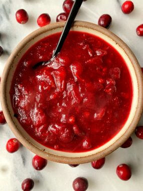 The Best Healthier Cranberry Sauce made with just 4 ingredients! This is an easy lower sugar option to make and it is incredibly easy - you just need 10 minutes to make it.