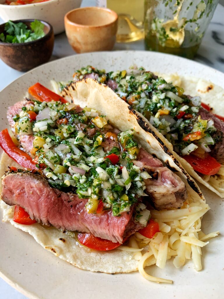 Epic Grill Pan Steak Tacos with Chimichurri Sauce! These are the ultimate steak tacos guys and you don't even need a grill to whip them up plus they're paleo and gluten-free.