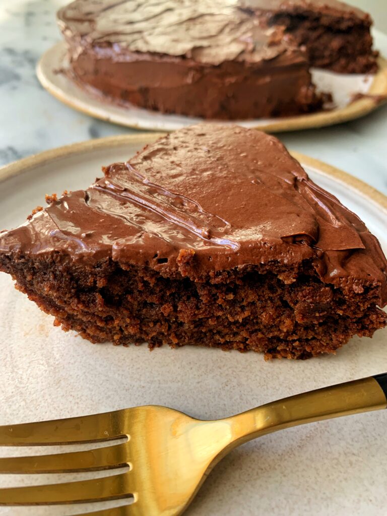 The Best Paleo Brownie Cake Ever made with all gluten-free, dairy-free and grain-free ingredients! This is the ultimate dessert for all my chocolate lovers who are craving something extra chocolatey and rich yet still made with healthy ingredients.