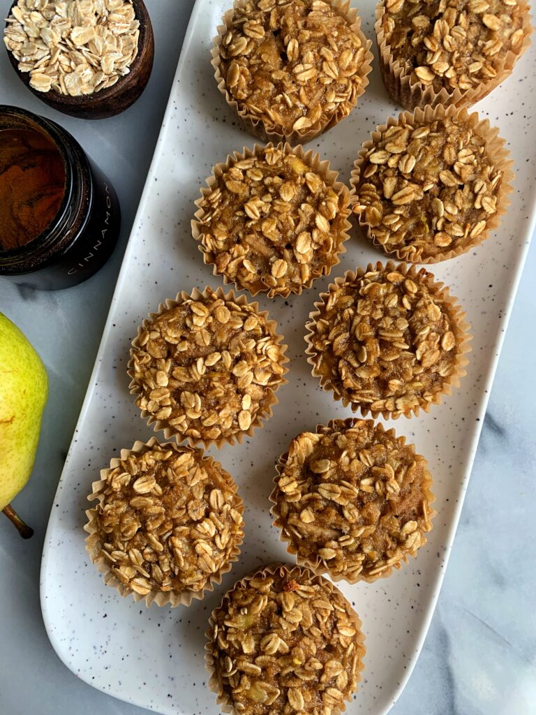 The dreamiest Cinnamon Pear Baked Oat Cups made with gluten-free, dairy-free and nut-free ingredients! Such an easy and healthy breakfast or snack recipe to prep.