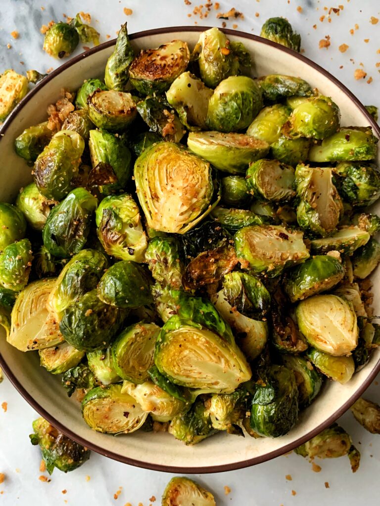 These Spicy Breadcrumb Brussels Sprouts are the most delicious vegan side dish! Tossed in homemade breadcrumbs with a little kick to them.