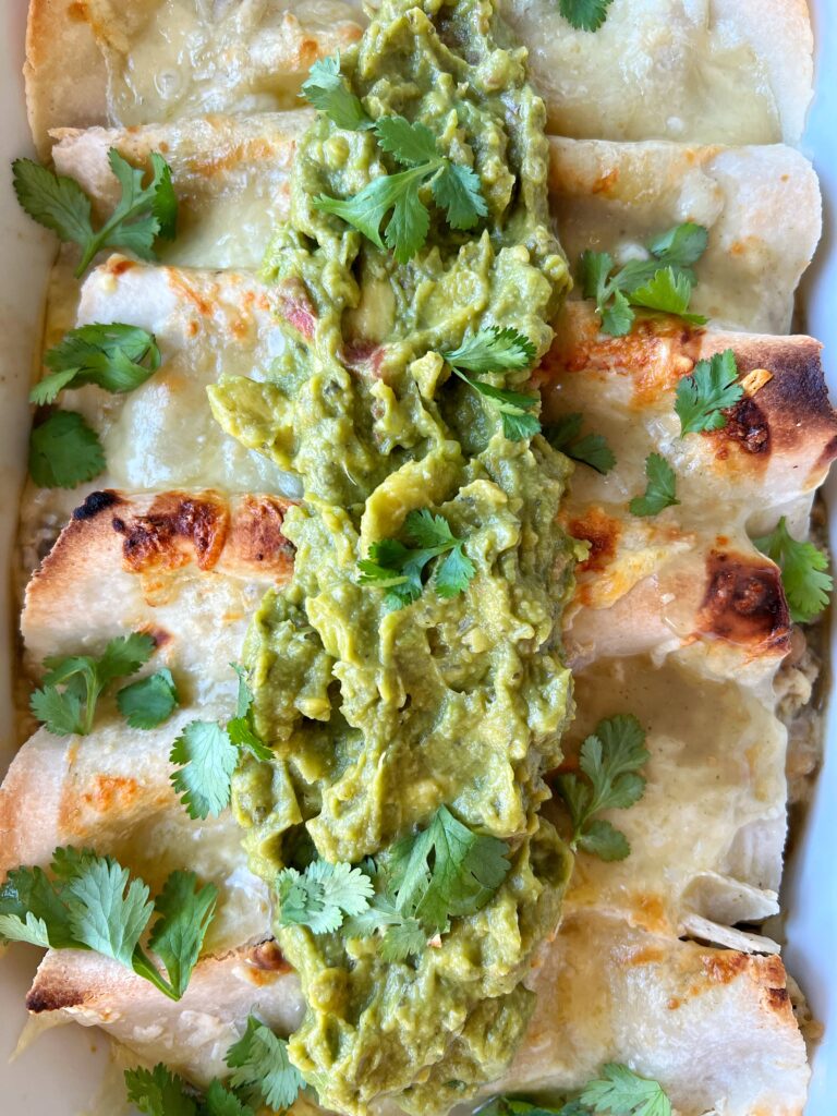 EASY Gluten-free Enchilada Recipe! This is our favorite quick and healthy way to make enchiladas plus they're gluten-free and ready in just 30 minutes. 
