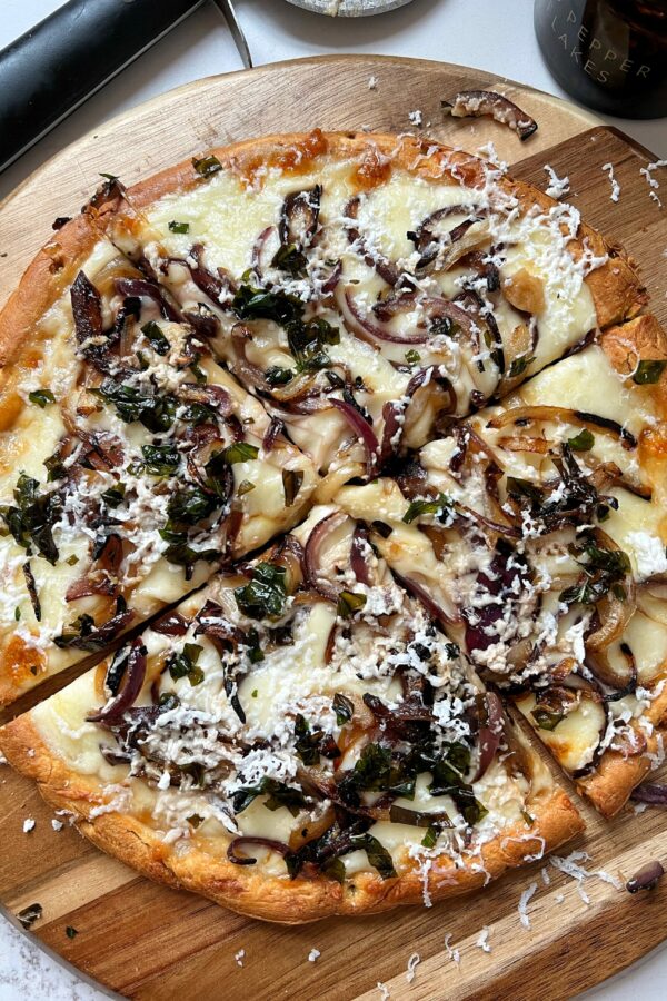 White Pizza with Caramelized Onions and Crispy Basil