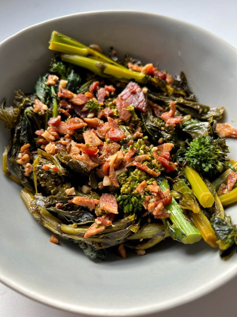 This Braised Broccoli Rabe with Garlicky Bacon is the ultimate Whole30-friendly side dish to spice things up. It only takes 20 minutes to cook and is absolutely delicious to pair with your meal.