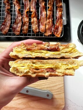 Sharing how to make a STUFFED Waffle Breakfast Sandwich. Imagine your favorite waffles stuffed with bacon, egg and cheese? YUP this is happening.
