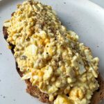 Finally sharing how to make the BEST Egg Salad. We make this for lunch every week and it truly is the ultimate salad to add to your favorite bread, bagel or with crackers.
