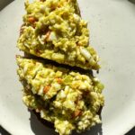 This is the ultimate dairy-free egg salad made with no mayo, no yogurt and instead we use some mashed avocado. This healthy lunch recipe is Whole30 and a staple in my weekly meal prep.