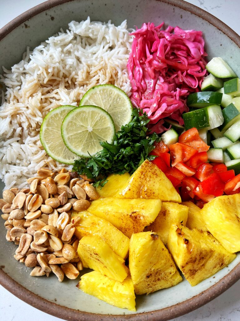 This healthy Thai Pineapple Rice Salad is an easy and delicious recipe to make for lunch or dinner. It's vegan, gluten-free and a great meal to prep for the week!