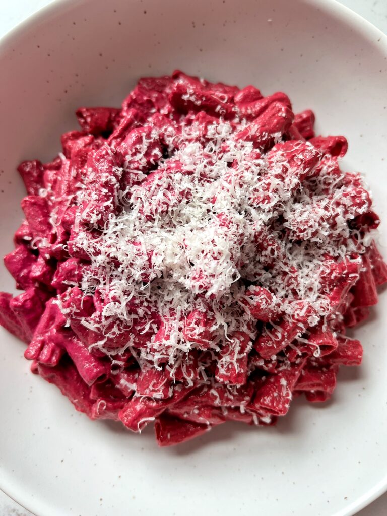 My favorite Beet Pesto recipe that is made with gluten-free ingredients and takes 5 minutes to make. This recipe pairs perfectly with your favorite pasta, pizza or as a dip.