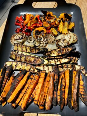 How to Grill Vegetables in a few simple and easy steps all season long like peppers, onions, zucchini and sweet potato fries!