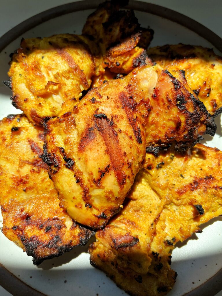 This Grilled Yogurt Marinated Chicken is the absolute best recipe to make when you want extra flavorful chicken that is juicy and so easy to make.