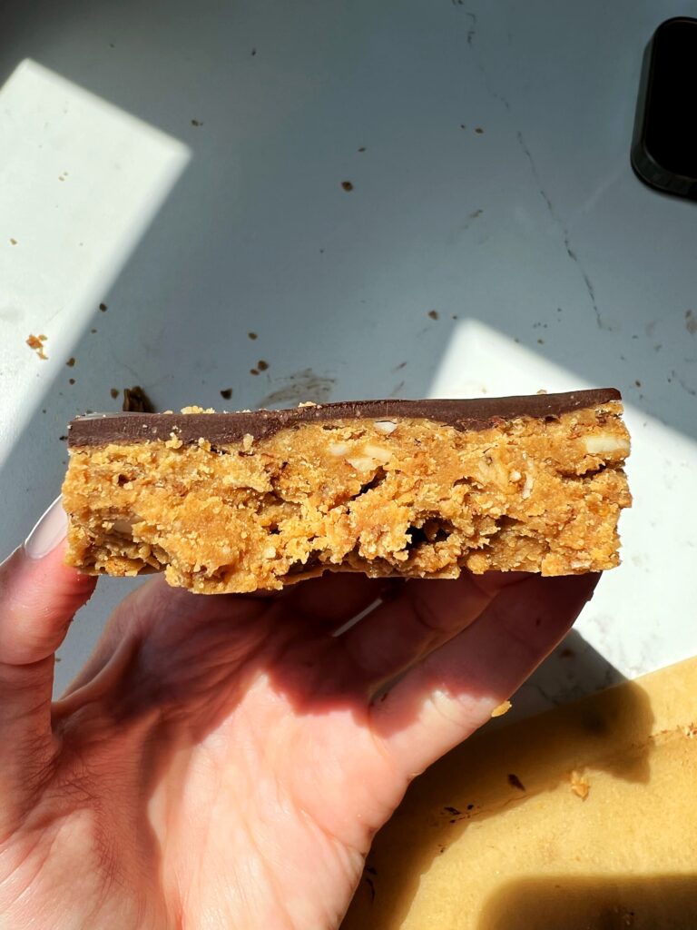 Vegan Chocolate Peanut Butter Cereal Bars made with all gluten-free ingredients. A healthier twist on a scotcheroo bar meets rice krispie treat meets peanut butter cup!