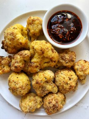 Crispy Baked Cauliflower Nuggets made with glute-free ingredients for an easy and delicious side dish to your meal and dip them in any sauces you'd like.
