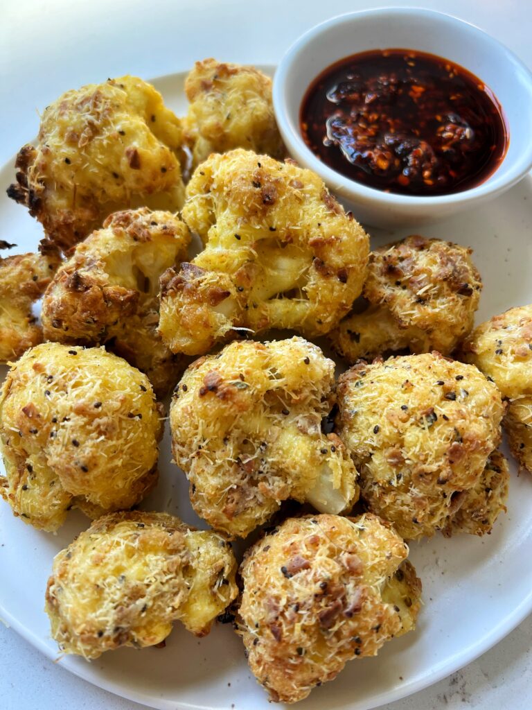 Crispy Baked Cauliflower Nuggets made with glute-free ingredients for an easy and delicious side dish to your meal and dip them in any sauces you'd like.
