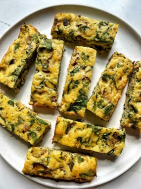 These Gluten-free Veggie Frittata Slices are a staple in our home for both myself and my kids! A great recipe to meal prep for the week and add in any veggies or mix-in's you are craving.
