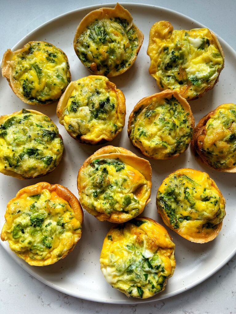 These Mini Egg Tortilla Cups are one of my go-to meal prep recipes! Made with all gluten-free ingredients and they're packed with protein and veggies and are kid-approved.