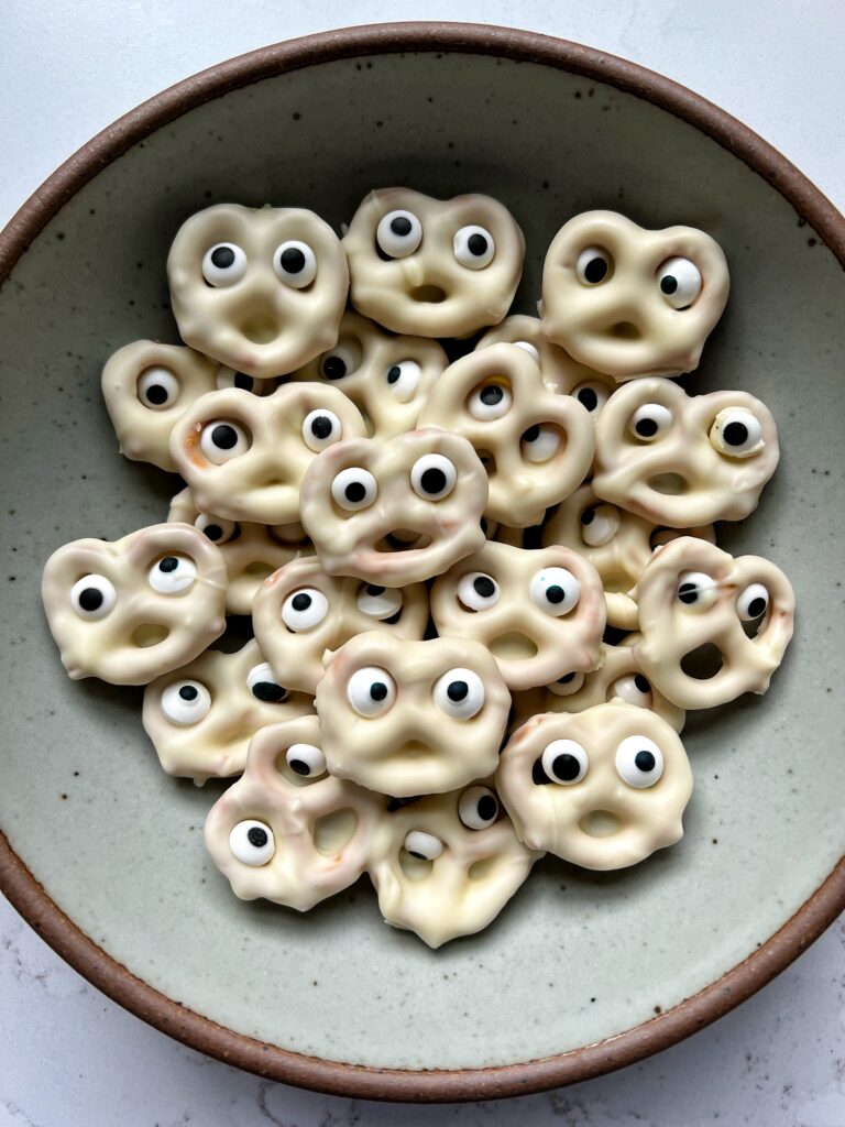 These 3-ingredient Ghost Pretzels are a must make snack for Halloween! They're easy to make and epic for a sweet and salty crunchy snack to eat.