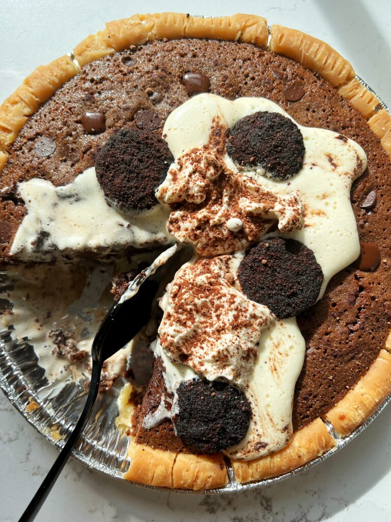 This Chocolate Brownie Pie is the ultimate chocolate pie recipe made with gluten-free and nut-free ingredients! Super chocoatey and filled gooey brownies and topped with whipped cream.