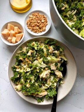 This Kale and Rotisserie Chicken Salad with Peanut Dressing is crazy good. Elevate your salad bowl with this satisfying recipe. Filled with kale cabbage, herbs, peanuts and tossed in a peanut-sesame dressing.
