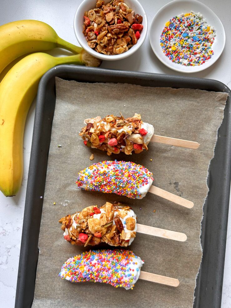 These Frozen Yogurt Banana Pops are a MUST try. They're made with just 3 ingredients and are great for kids, adults and are a fun snack to make.